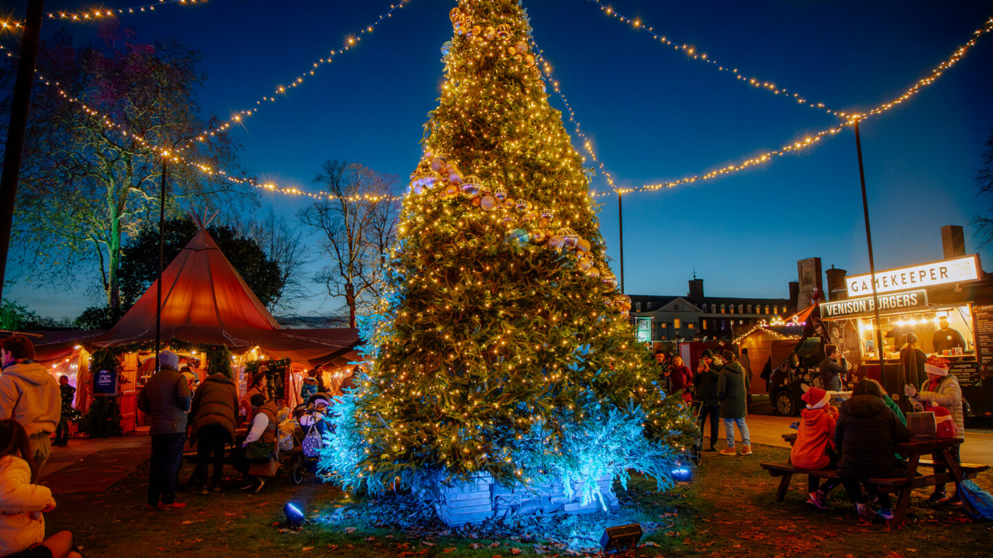 Big Christmas tree with alpine Christmas bars in the London winter